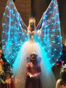 LED Light Up Isis Wings Stilt Walking Walker Ice Queen Castle Snow Princess Icicle Hire Performer Dancer Winter Fest Festival of Lights Lighting Holiday Stroll Fire and Ice Massachusetts LED Light Up Isis Wings Stilt Walking Walker Ice Queen Castle Snow Princess Icicle Hire Performer Dancer Winter Fest Festival of Lights Lighting Holiday Stroll Fire and Ice Massachusetts